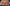 Animated preview of War Stream Overlay showing product title screen, Starting Soon scene, stinger transition, webcam frame and stream elements